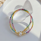 Choker necklace with rainbow pendant and pearls