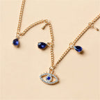 Choker Necklace with Turkish Blue Evil Eye Pendant, Rhinestones and Pearls gold