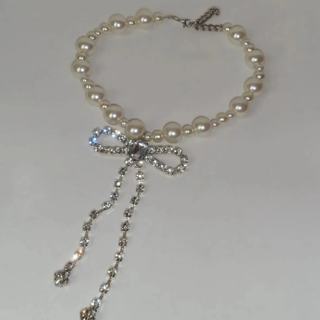 Choker necklace with rhinestone bow tie pendant