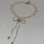 Choker necklace with rhinestone bow tie pendant