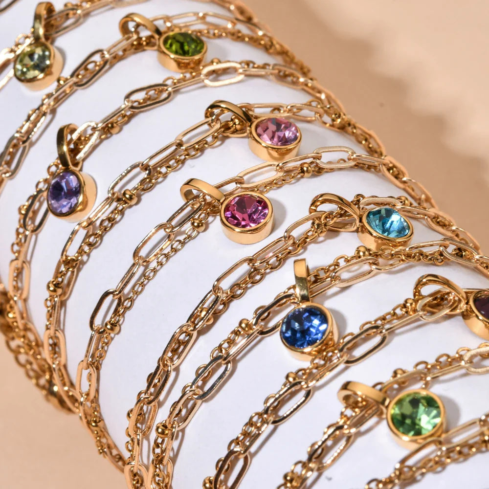Double gold bracelet with birthstone