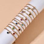 Double gold bracelet with January birthstone