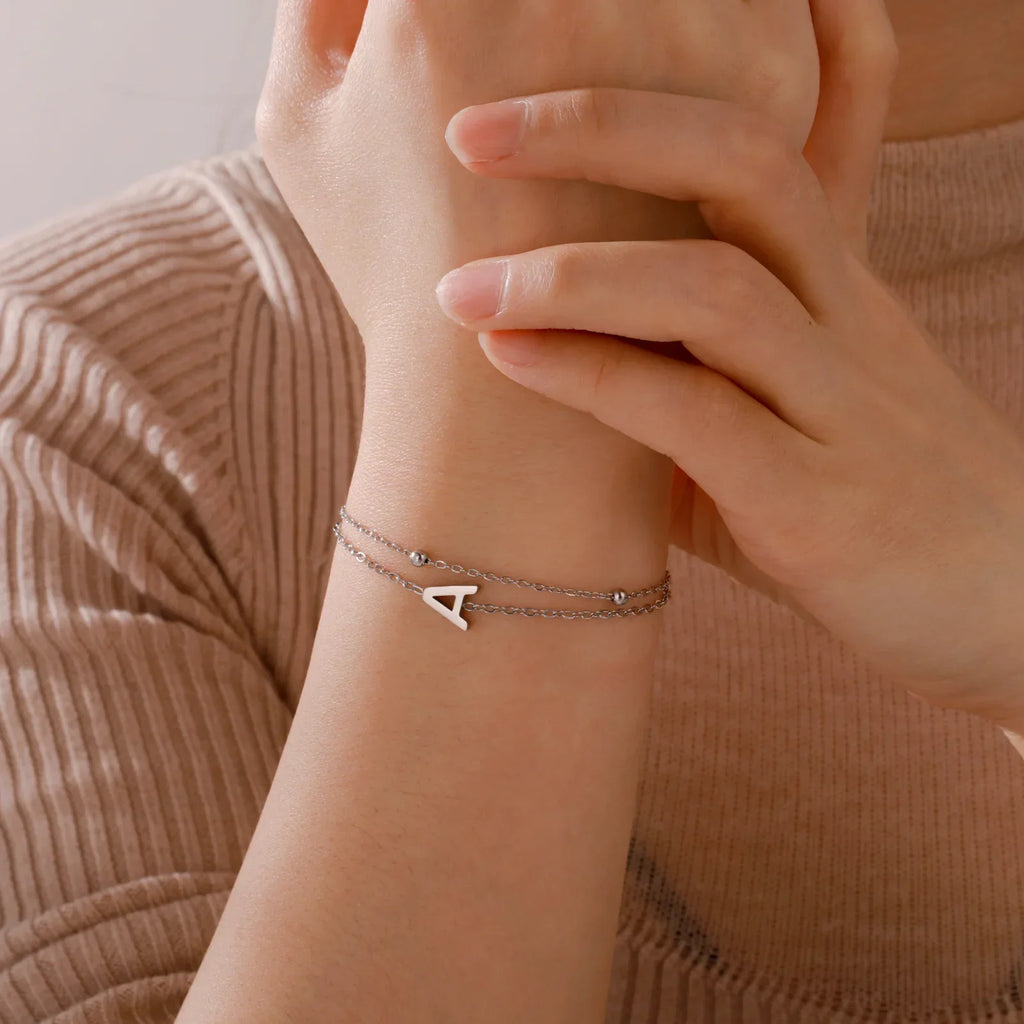 Double initial bracelet gold and silver 