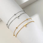 Double initial bracelet gold and silver l