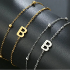Double initial bracelet gold and silver  b