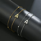 Double initial bracelet gold and silver  a