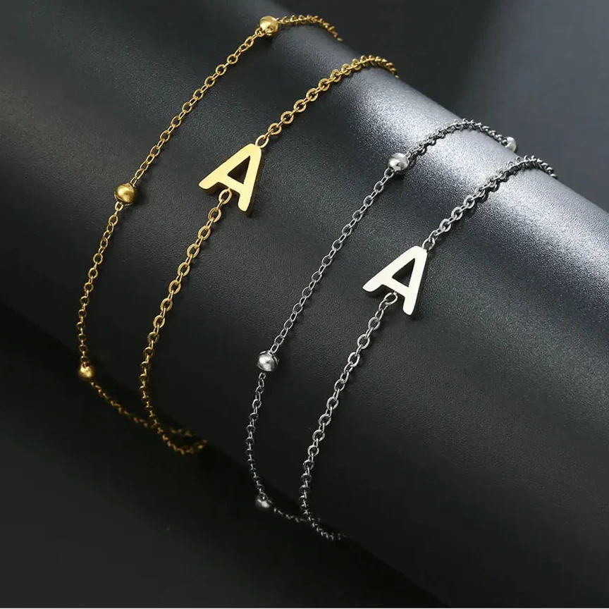 Double initial bracelet gold and silver a