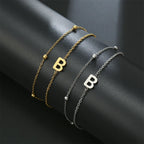 Double initial bracelet gold and silver  b
