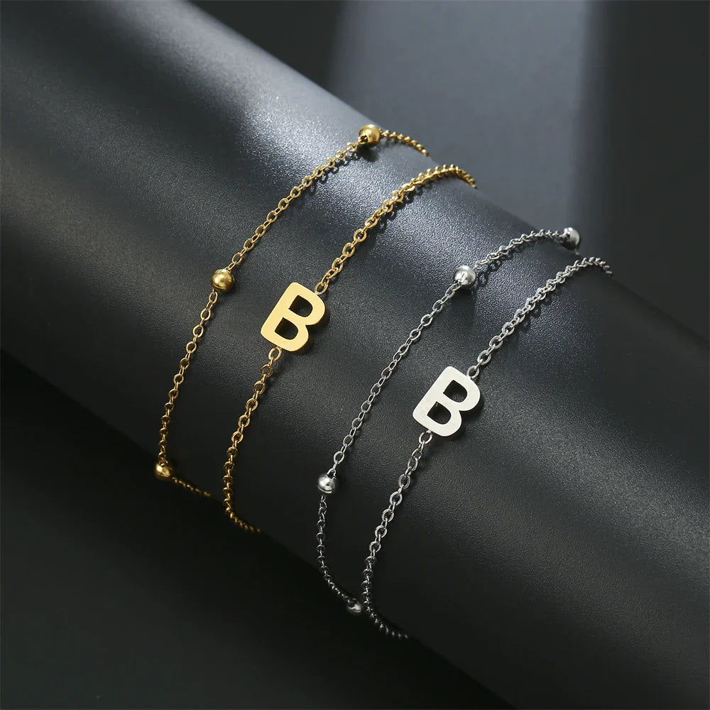 Double initial bracelet gold and silver  b