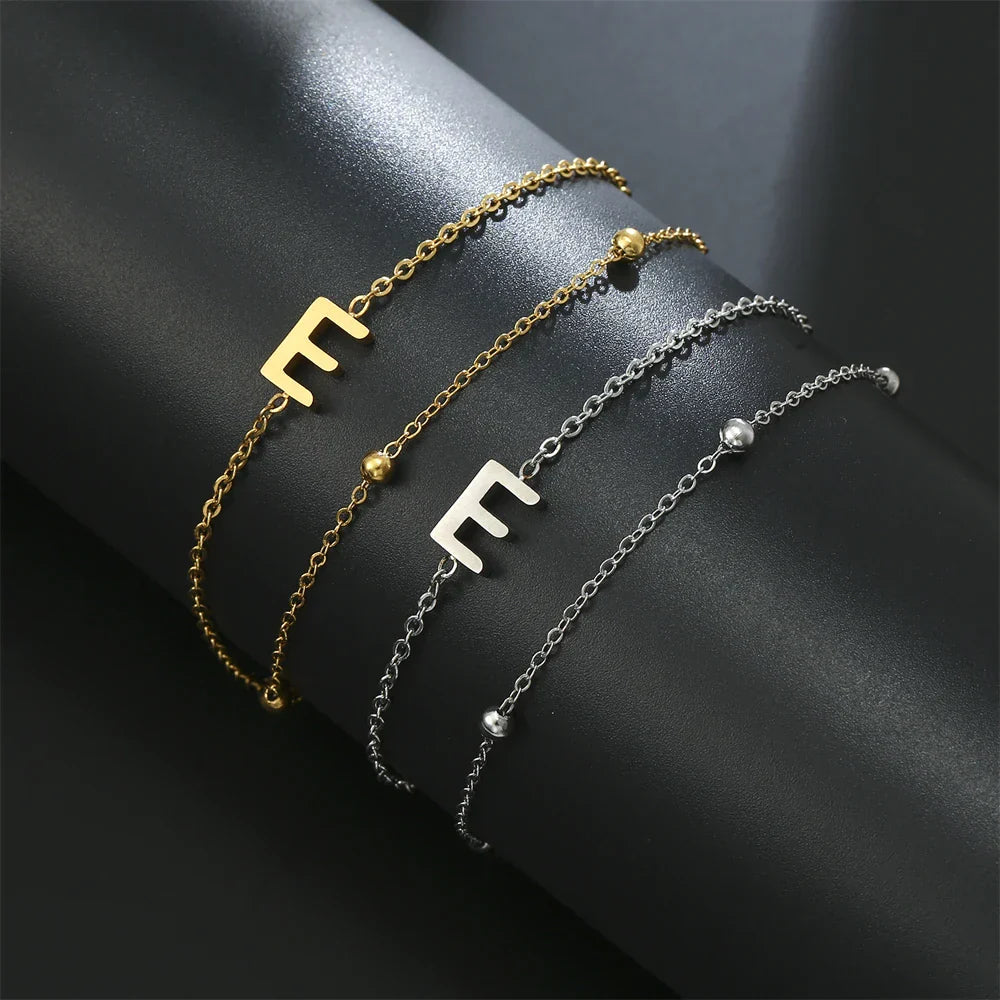 Double initial bracelet gold and silver  e