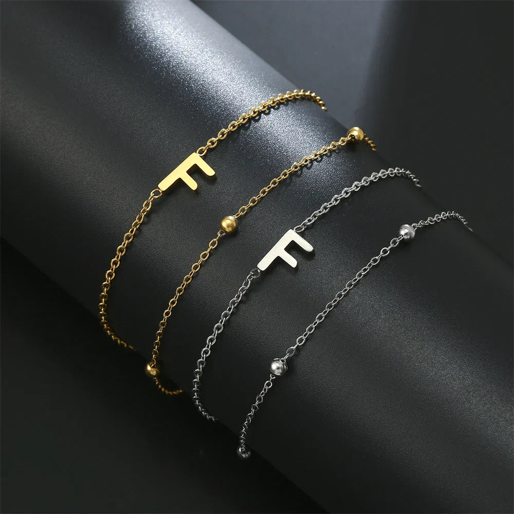 Double initial bracelet gold and silver  f