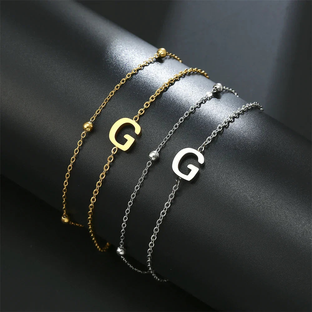 Double initial bracelet gold and silver  g