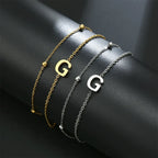 Double initial bracelet gold and silver  g
