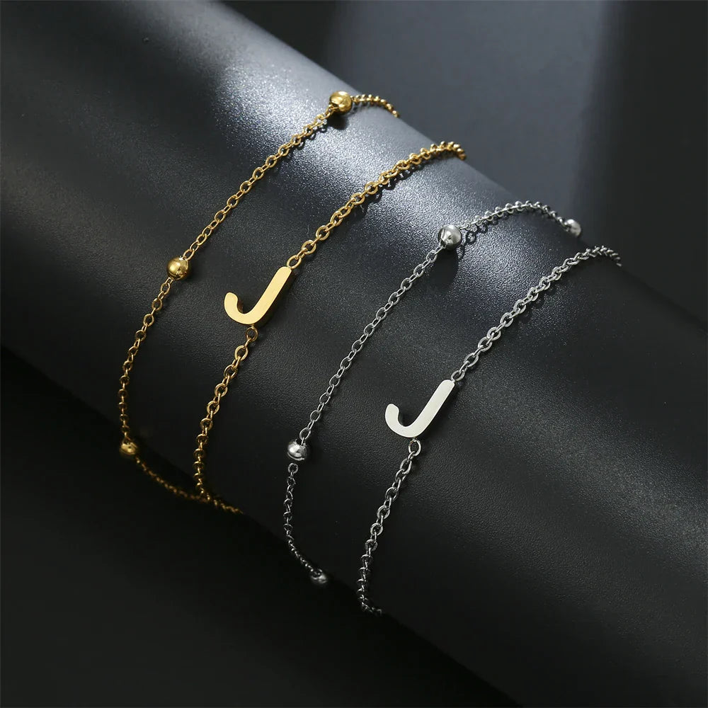 Double initial bracelet gold and silver  j