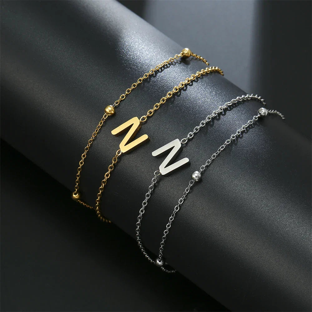 Double initial bracelet gold and silver  n