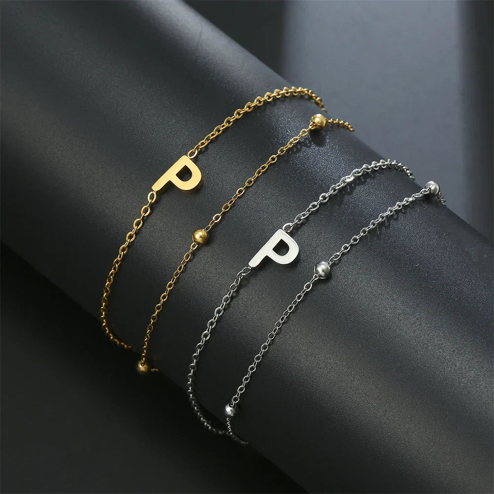 Double initial bracelet gold and silver  p