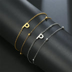 Double initial bracelet gold and silver  p