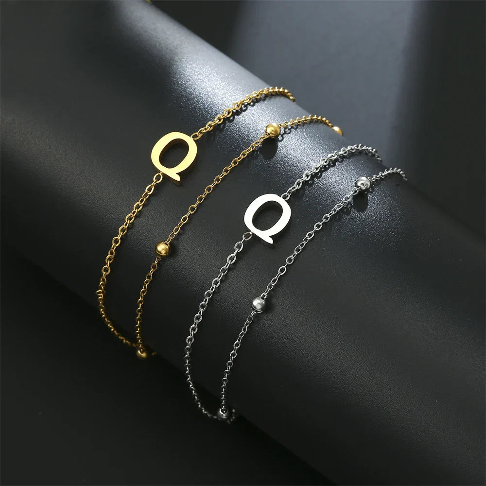 Double initial bracelet gold and silver  q