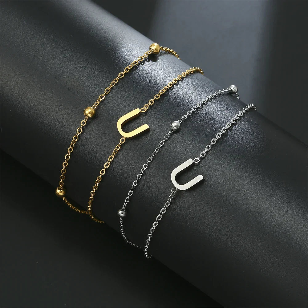 Double initial bracelet gold and silver  u