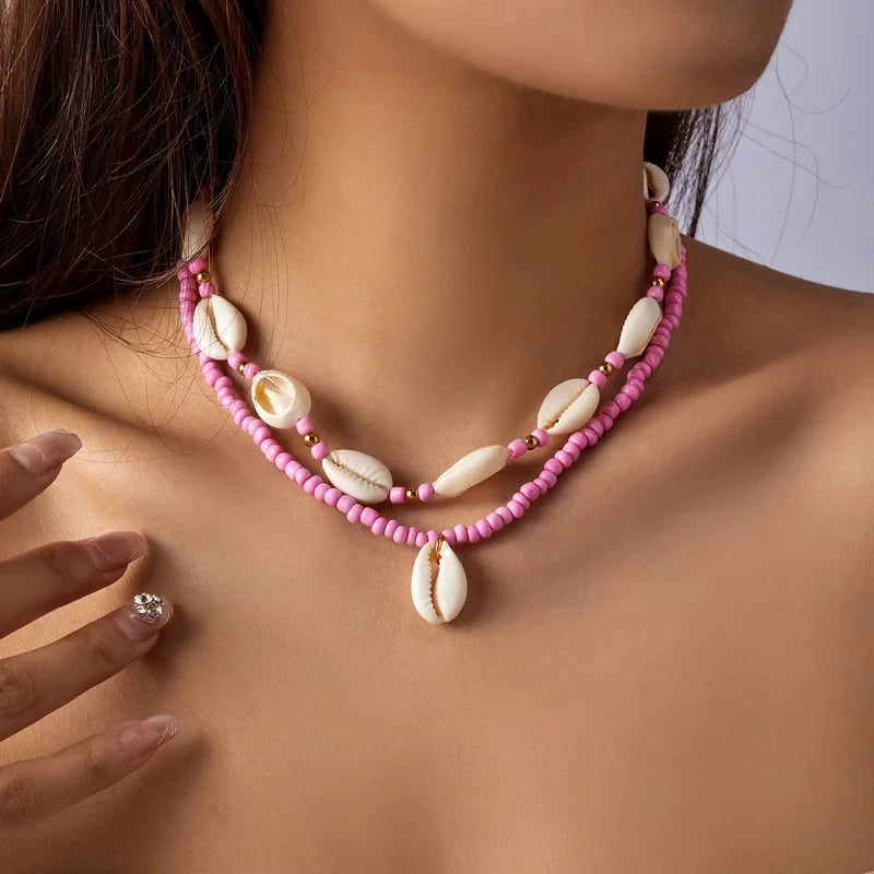Double cowrie shell necklace pink
