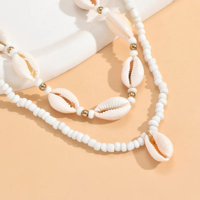 Double cowrie shell necklace white