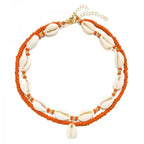 Double cowrie shell necklace red