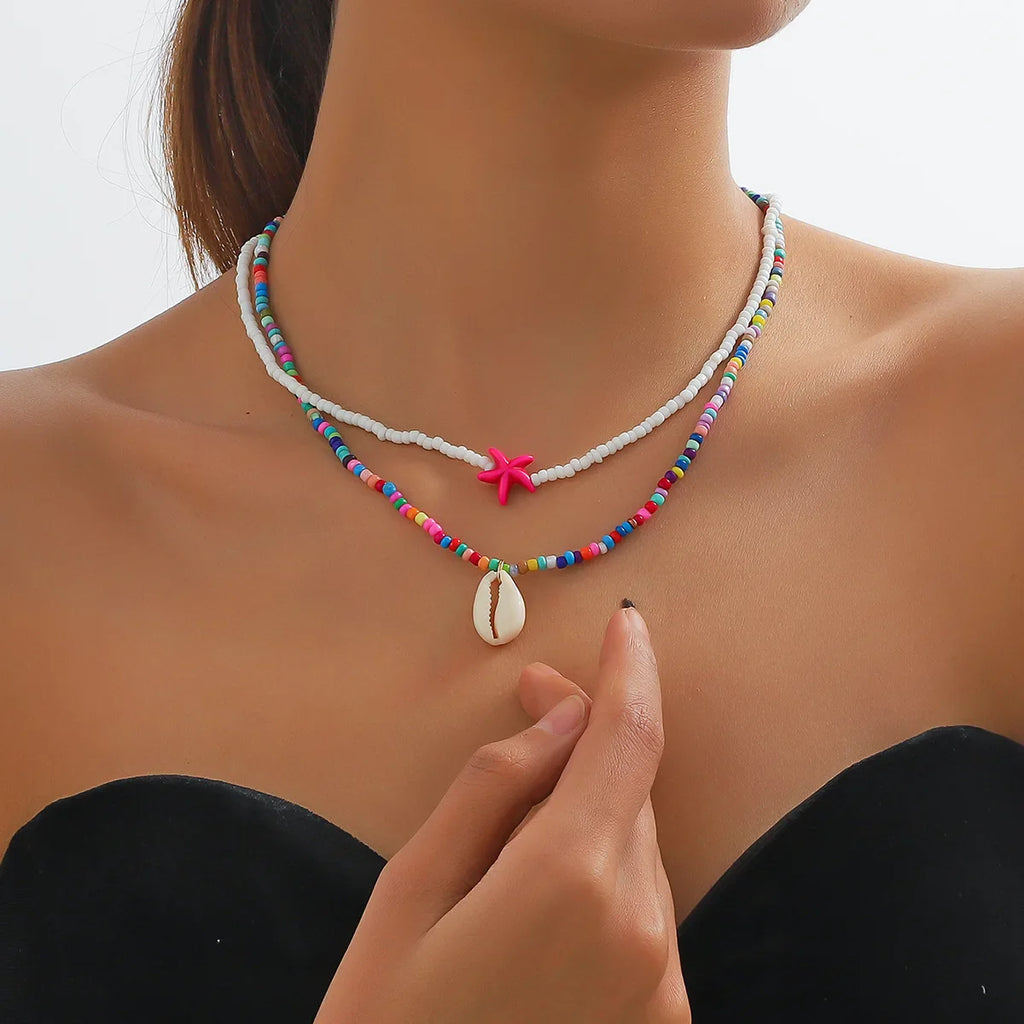 Double shell necklace and multicolored beads
