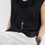 Long rope necklace with matte silver key pendant