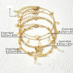 Set of 5 anklets: star, infinity, butterfly, beads, and heart