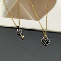 Black couple pendant